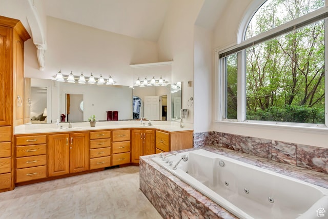 542 E 10000 S, Salem, UT 84653 - full bath with lofted ceiling, a tub with jets, and double vanity