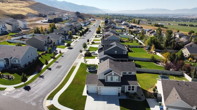 aerial view of residential area with mountains