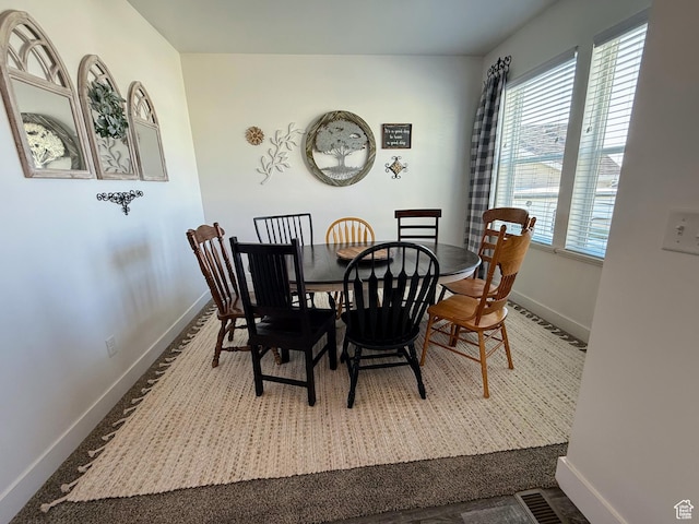 dining space with baseboards