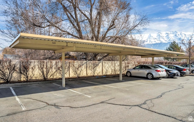 1195 W Dallin Dr N Unit R301, Pleasant Grove, UT 84062 - covered parking lot with fence and a mountain view