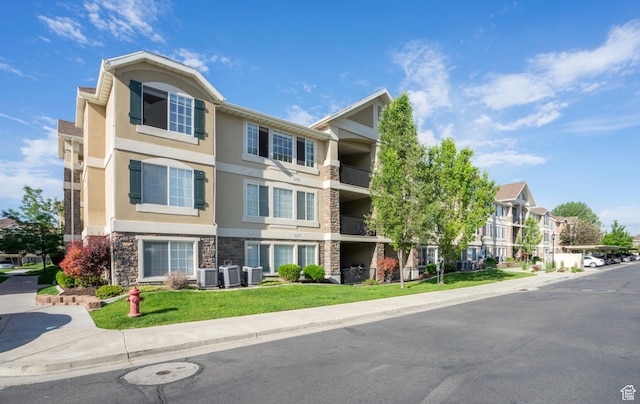 1195 W Dallin Dr N Unit R301, Pleasant Grove, UT 84062 - view of property with cooling unit and a residential view