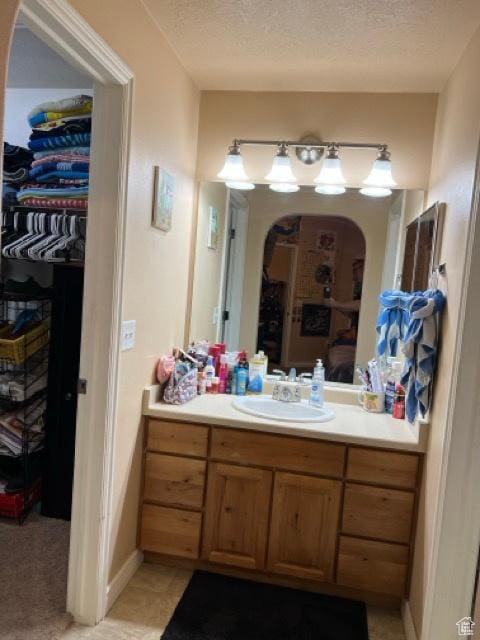 1195 W Dallin Dr N Unit R301, Pleasant Grove, UT 84062 - bathroom with vanity and a textured ceiling