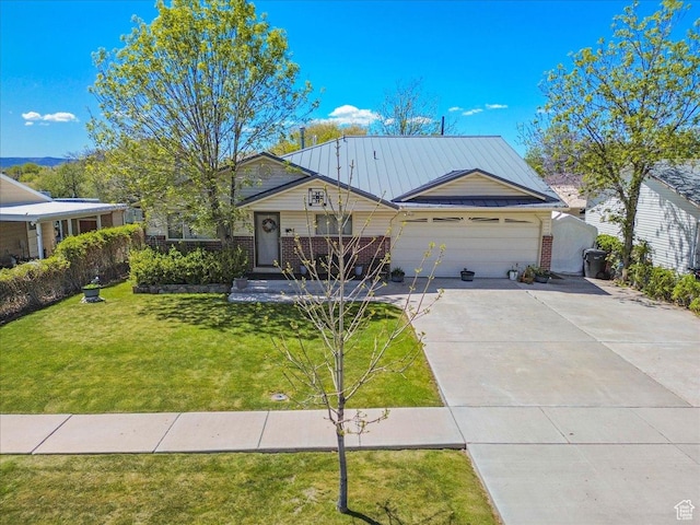 377 N 300 E, Nephi, UT 84648 - view of front of house featuring concrete driveway, a garage, a front yard, brick siding, and metal roof