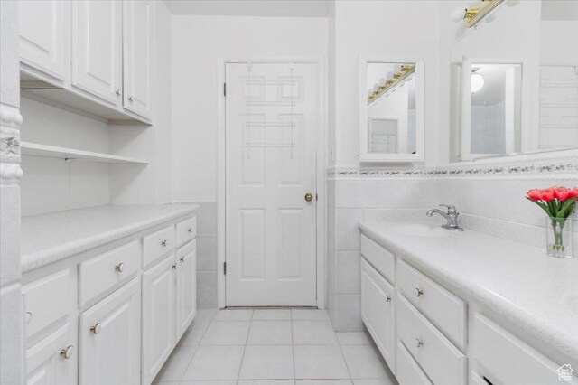 377 N 300 E, Nephi, UT 84648 - bathroom featuring tile patterned floors, tile walls, and vanity