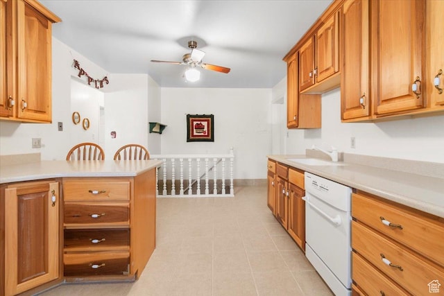 377 N 300 E, Nephi, UT 84648 - kitchen featuring white dishwasher, a sink, ceiling fan, light countertops, and brown cabinets