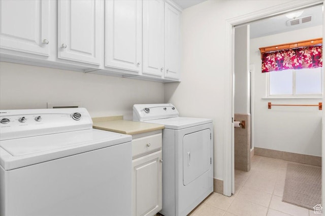377 N 300 E, Nephi, UT 84648 - laundry area with washer and dryer, cabinet space, light tile patterned floors, and baseboards