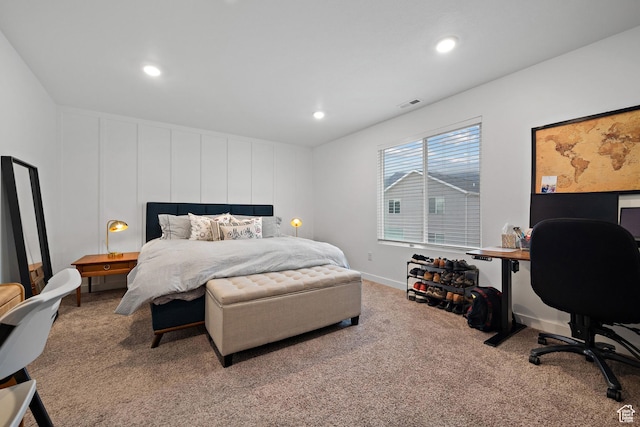carpeted bedroom featuring an office area, recessed lighting, and baseboards