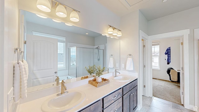 full bathroom featuring a shower stall, double vanity, and a bath