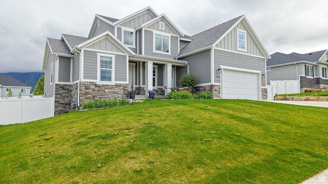 craftsman inspired home featuring board and batten siding, covered porch, stone siding, concrete driveway, and an attached garage