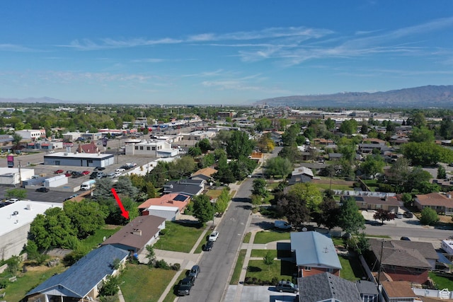 aerial perspective of suburban area with a mountain backdrop