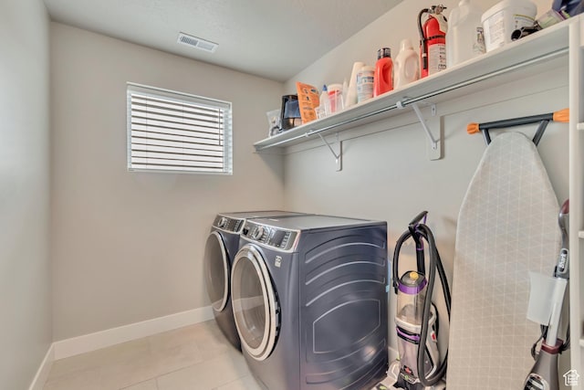 5402 N Meadow Lark Ln, Lehi, UT 84043 - laundry room with separate washer and dryer, baseboards, and light tile patterned floors