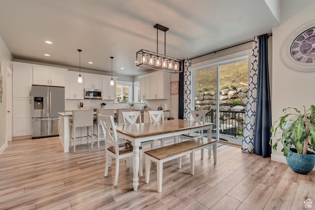 5402 N Meadow Lark Ln, Lehi, UT 84043 - dining room featuring light wood-style floors, recessed lighting, and baseboards