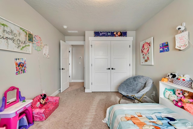 5402 N Meadow Lark Ln, Lehi, UT 84043 - carpeted bedroom with baseboards, a closet, and a textured ceiling