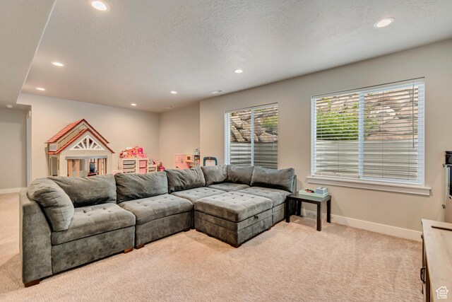 5402 N Meadow Lark Ln, Lehi, UT 84043 - living room with light carpet, recessed lighting, baseboards, and a textured ceiling