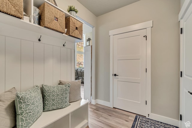 5402 N Meadow Lark Ln, Lehi, UT 84043 - mudroom with baseboards and light wood-style flooring