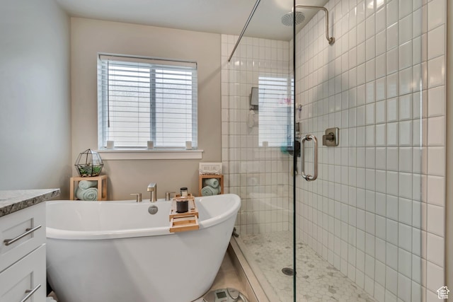 5402 N Meadow Lark Ln, Lehi, UT 84043 - bathroom with a stall shower, a freestanding tub, and vanity