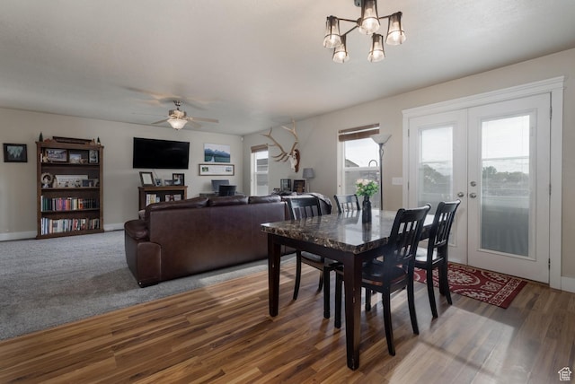 730 S 500 E, Roosevelt, UT 84066 - dining space with ceiling fan, a chandelier, wood finished floors, baseboards, and french doors