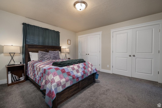 730 S 500 E, Roosevelt, UT 84066 - bedroom with two closets, carpet floors, baseboards, and a textured ceiling