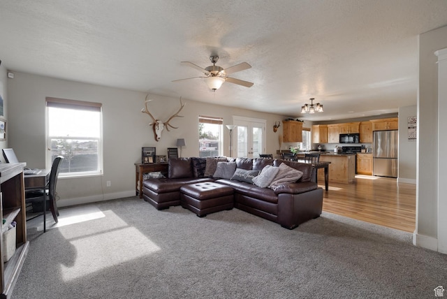 730 S 500 E, Roosevelt, UT 84066 - living area with light carpet, ceiling fan, and baseboards