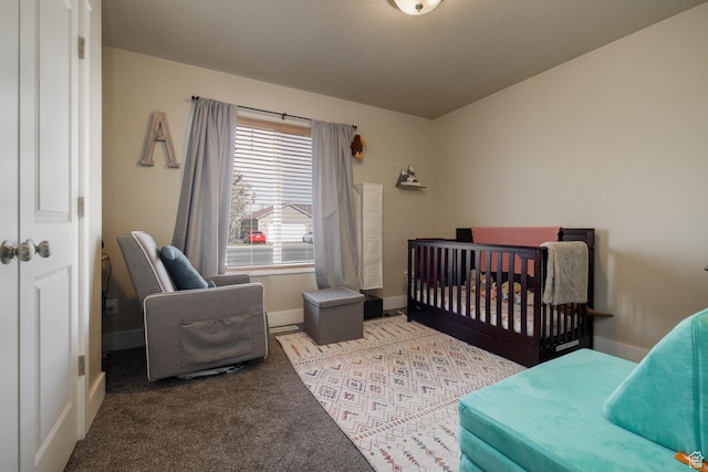 730 S 500 E, Roosevelt, UT 84066 - bedroom featuring baseboards, carpet, and a nursery area