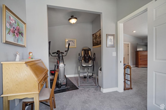 workout area with carpet floors and baseboards