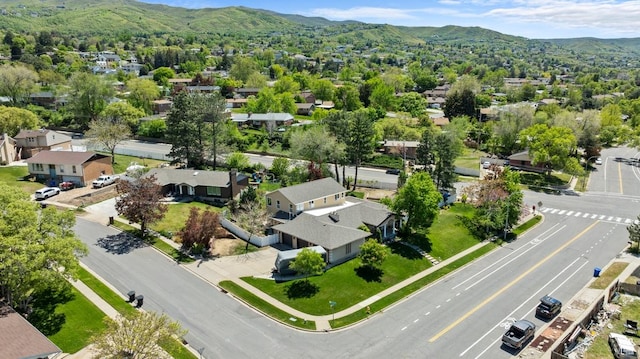 aerial view of residential area with a mountainous background