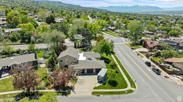 aerial perspective of suburban area with a mountainous background
