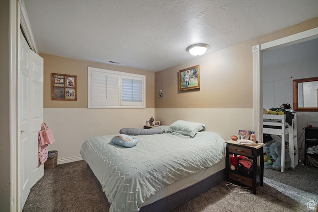bedroom featuring carpet