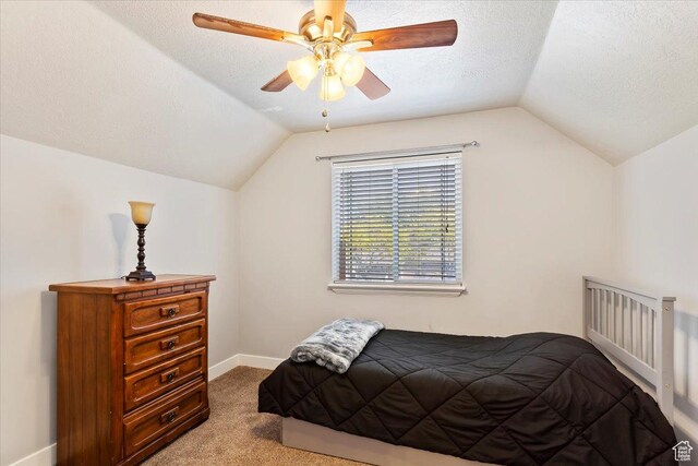 2099 W 700 S, Syracuse, UT 84075 - bedroom with vaulted ceiling, carpet, baseboards, a textured ceiling, and ceiling fan