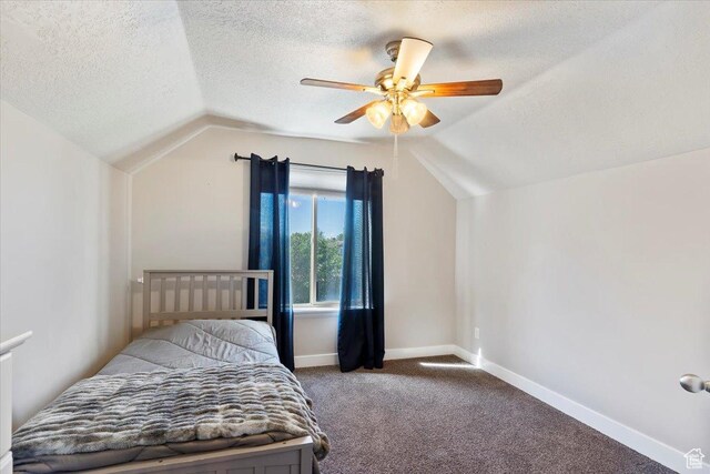 2099 W 700 S, Syracuse, UT 84075 - carpeted bedroom featuring vaulted ceiling, a textured ceiling, baseboards, and ceiling fan