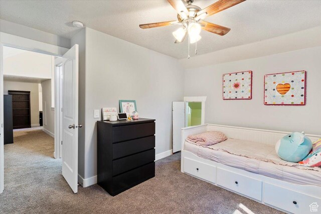 2099 W 700 S, Syracuse, UT 84075 - carpeted bedroom with baseboards, ceiling fan, and a textured ceiling