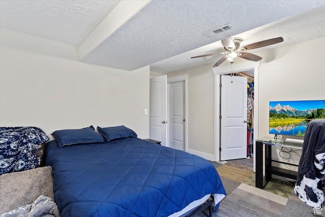 2099 W 700 S, Syracuse, UT 84075 - bedroom with a textured ceiling, ceiling fan, and baseboards