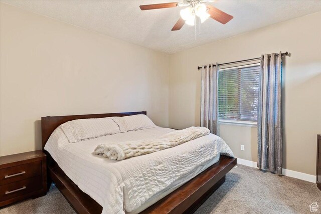 2099 W 700 S, Syracuse, UT 84075 - carpeted bedroom with baseboards, ceiling fan, and a textured ceiling