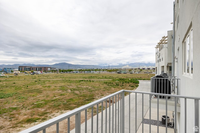 balcony featuring a mountain view