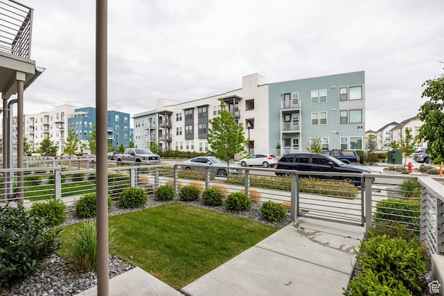 view of community with fence
