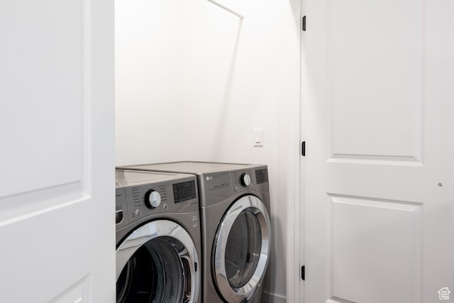 laundry area with washer and clothes dryer