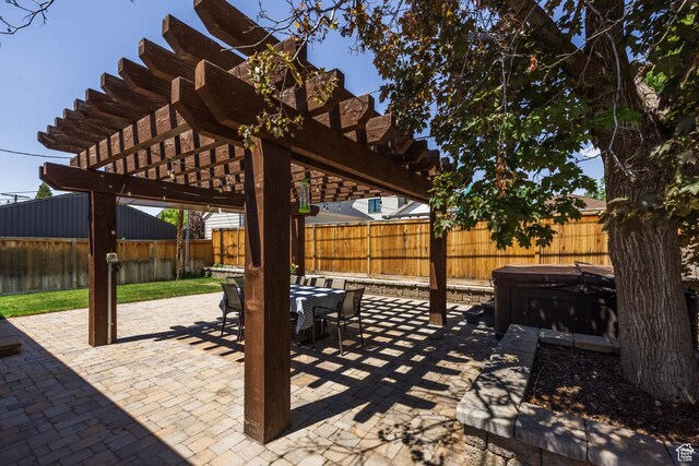 1845 E Princeton Ave, Salt Lake City, UT 84108 - fenced backyard with a hot tub, a pergola, a patio, and outdoor dining space