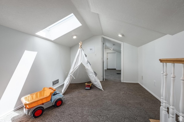 1845 E Princeton Ave, Salt Lake City, UT 84108 - rec room with a skylight, lofted ceiling, and carpet floors