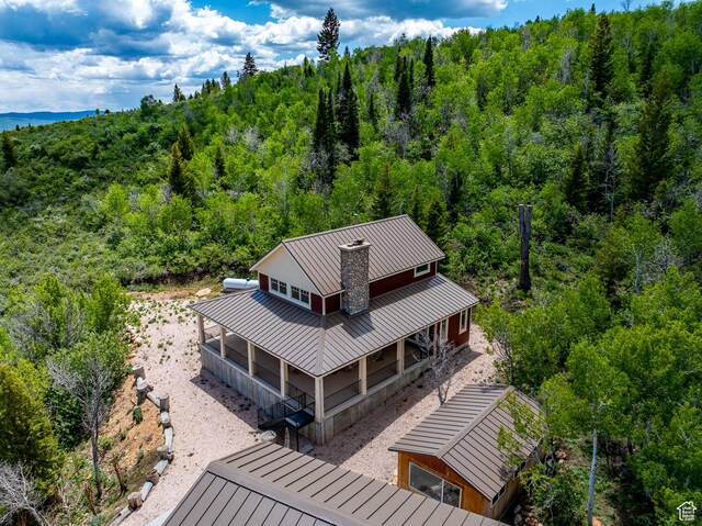 3431 S Panorama Dr, Garden City, UT 84028 - aerial view of property and surrounding area with a heavily wooded area