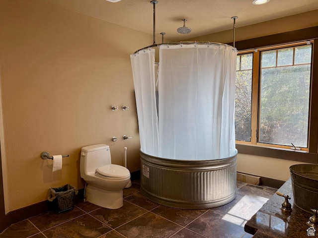 3431 S Panorama Dr, Garden City, UT 84028 - full bath with toilet, curtained shower, and baseboards