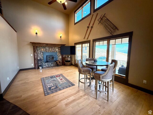 3431 S Panorama Dr, Garden City, UT 84028 - dining area with a towering ceiling, a ceiling fan, plenty of natural light, and wood finished floors