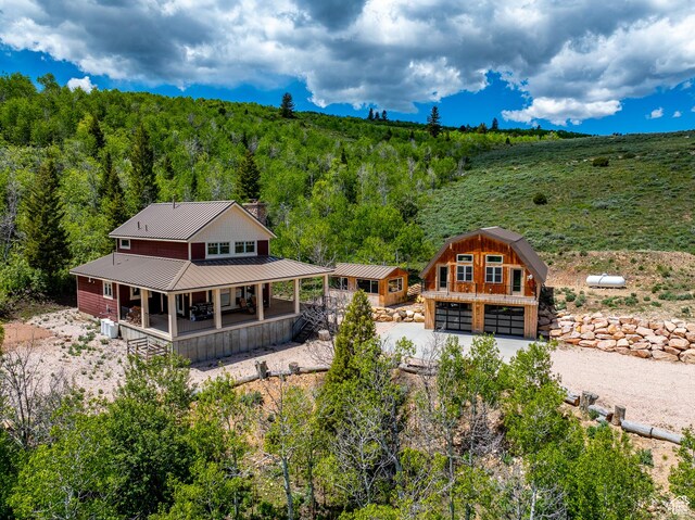 3431 S Panorama Dr, Garden City, UT 84028 - aerial view of property and surrounding area featuring a forest