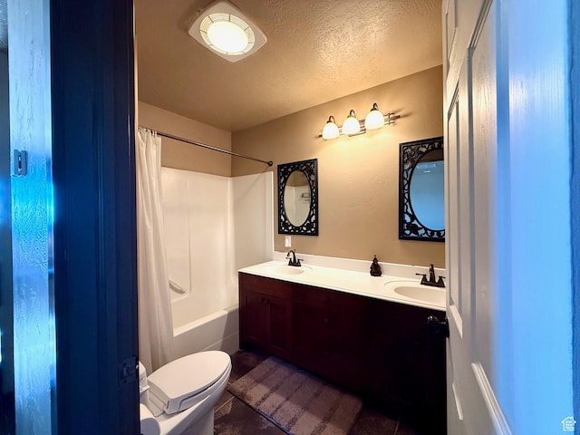 3431 S Panorama Dr, Garden City, UT 84028 - bathroom with toilet, double vanity, shower / tub combo, a textured ceiling, and tile patterned flooring