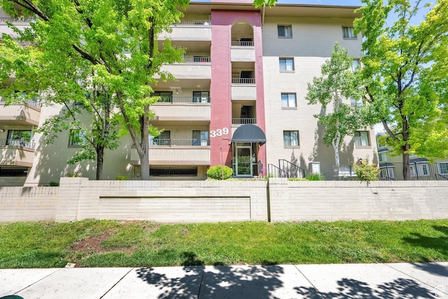 339 E 600 S Unit 1111, Salt Lake City, UT 84111 - view of apartment building / complex with fence