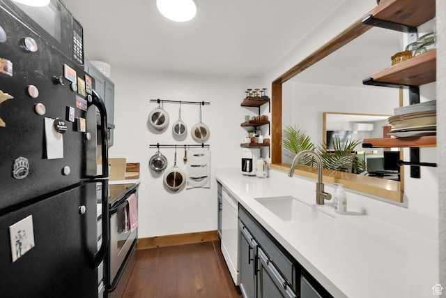 339 E 600 S Unit 1111, Salt Lake City, UT 84111 - kitchen with open shelves, freestanding refrigerator, a sink, and light countertops