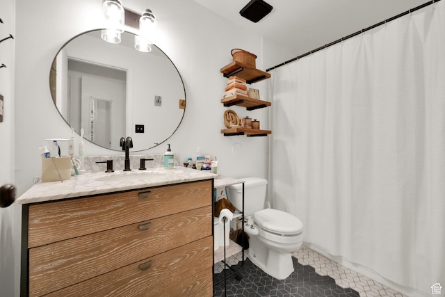339 E 600 S Unit 1111, Salt Lake City, UT 84111 - full bathroom featuring toilet, vanity, tile patterned flooring, and curtained shower
