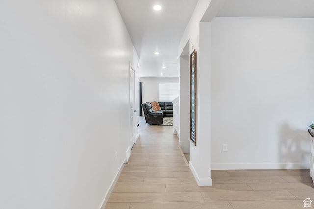 2571 N Geranium Dr W Unit 239, Saratoga Springs, UT 84045 - corridor with light wood-style floors, baseboards, and recessed lighting