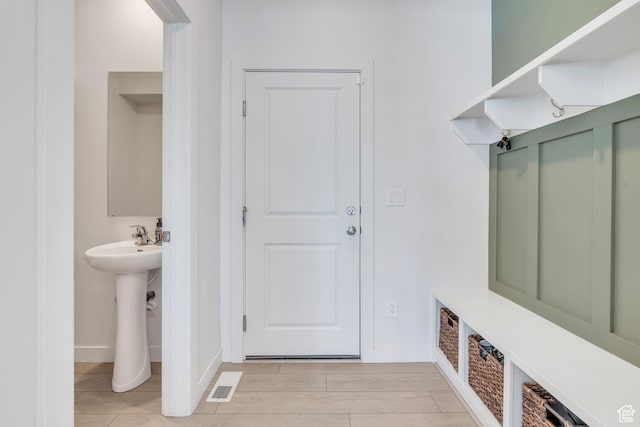 2571 N Geranium Dr W Unit 239, Saratoga Springs, UT 84045 - mudroom with baseboards and a sink