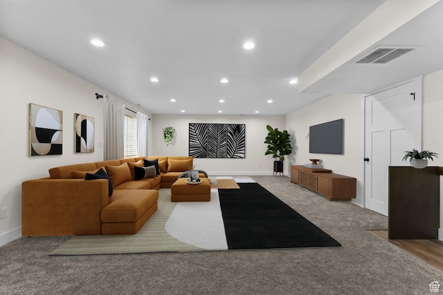 living area featuring recessed lighting, carpet floors, and baseboards