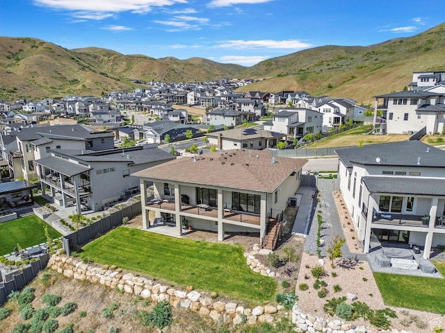 aerial view of residential area with mountains